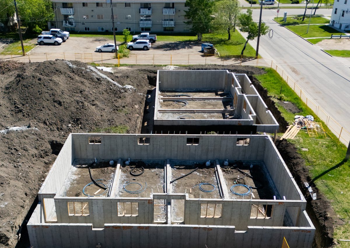 Cluster housing foundation construction progress photo