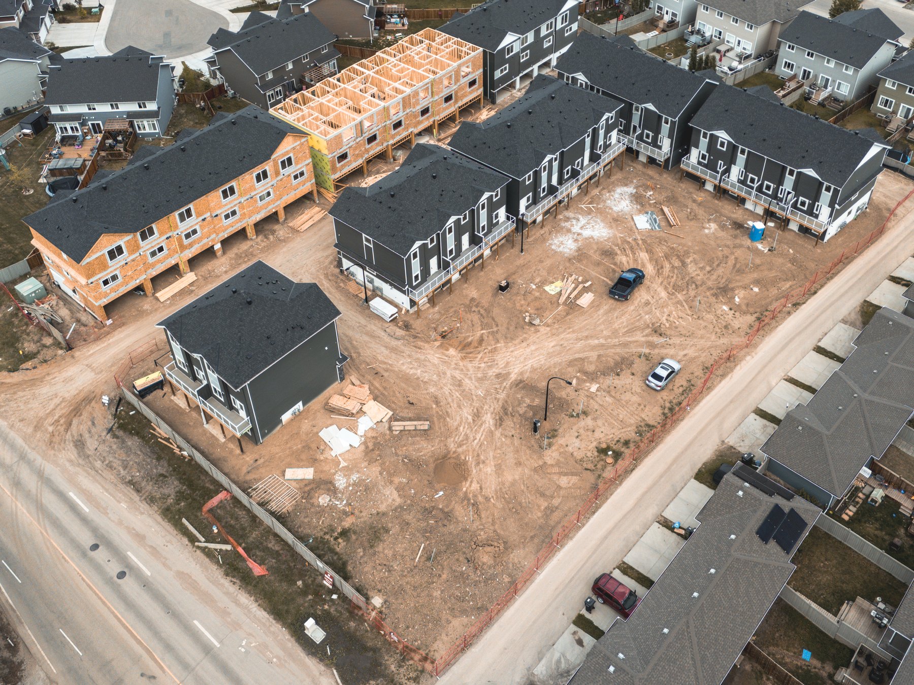 Aerial of a townhouse subdivision under construction in Edmonton, engineered by Oasis Engineering