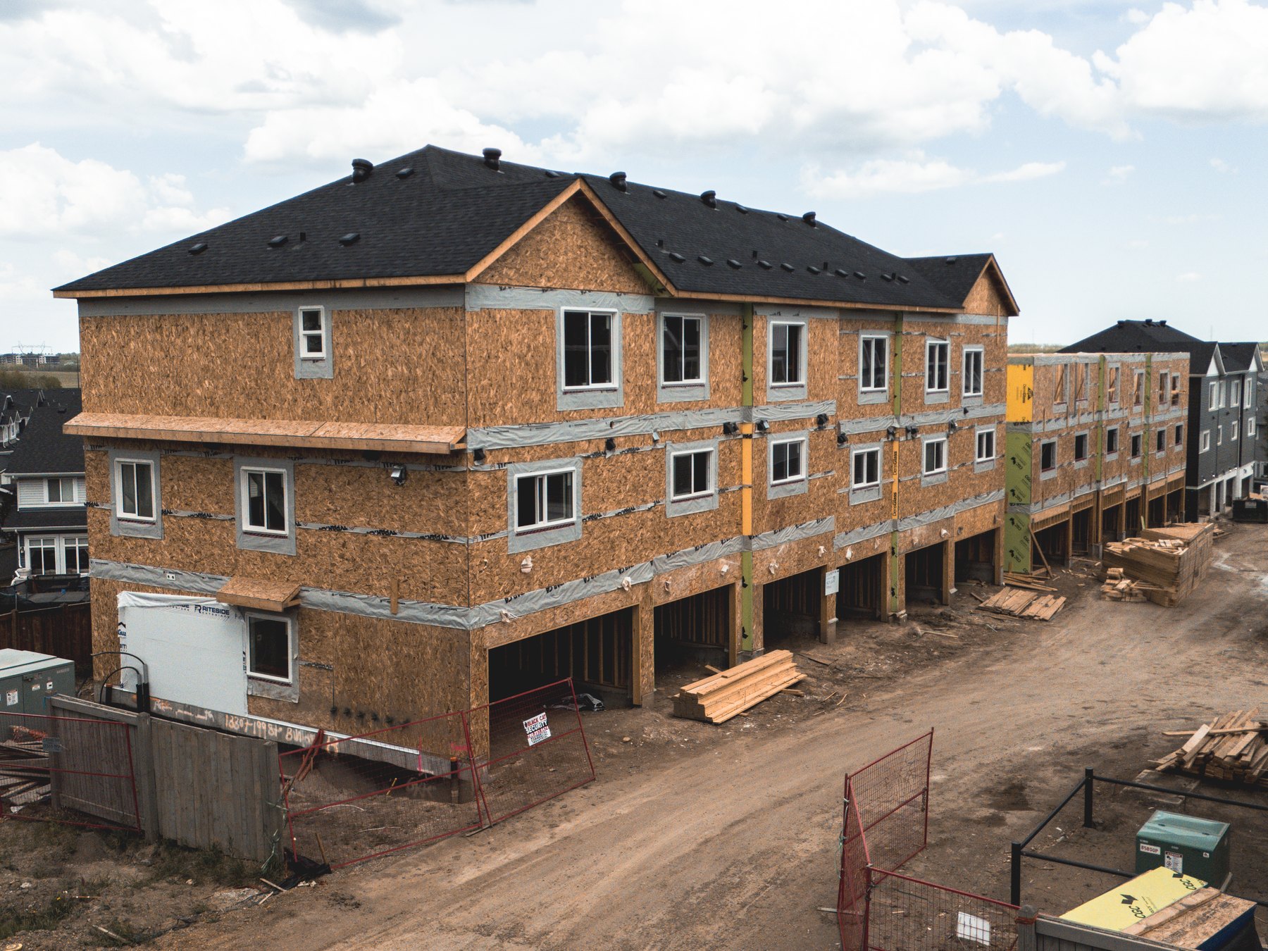 Wood framing progress on a 62-unit townhouse development, structural engineering by Oasis Engineering