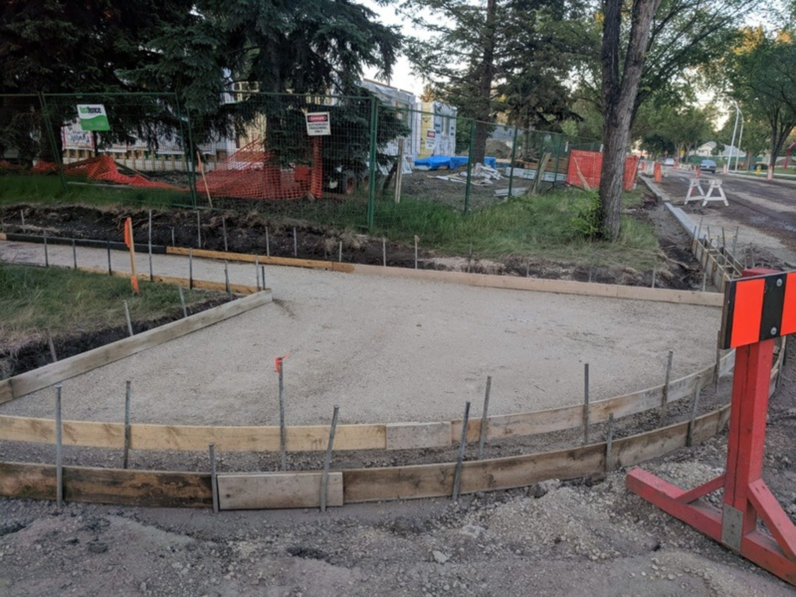 Concrete curb formwork for a new roadway