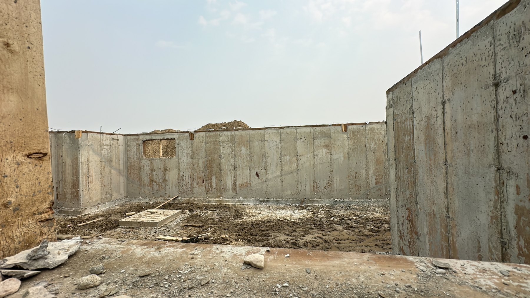 Site review of new foundation walls